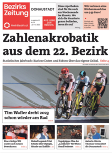 Titelseite einer deutschsprachigen Zeitung mit Radrennfahrern, einer fetten Schlagzeile über Statistiken aus dem 22. Wiener Gemeindebezirk und Teasern für Artikel über Wohnen, vegane Ernährung und lokale Veranstaltungen.