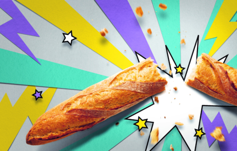 Ein in zwei Hälften zerbrochenes Baguette mit herumfliegenden Krümeln vor einem farbenfrohen Hintergrund im Comic-Stil mit Sternschnuppen und Blitzen.
