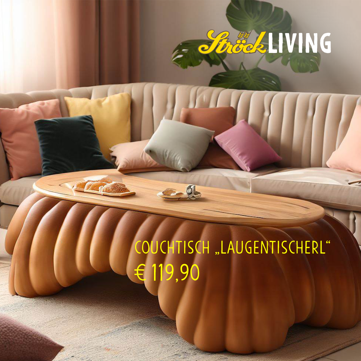Ein gemütliches Wohnzimmer mit einem beigen Sofa, bunten Kissen und einem Couchtisch aus Holz in Form einer Brezel. Der Text lautet: "Ströck Living. Couchtisch Laugentischerl €119,90.".