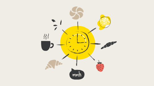 Illustration einer gelben Uhr, umgeben von Frühstücksgegenständen: eine Tasse Kaffee, ein Croissant, ein Gebäckstück, eine Erdbeere, eine Zitrone und das Wort mmh in einer Sprechblase, die auf die Frühstückszeit hinweist.