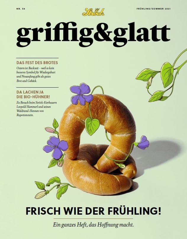 Ein glänzendes Brötchen in Form eines Halbmondes ist mit lila Blumen und grünen Ranken vor einem hellgrünen Hintergrund verziert. Der deutsche Text hebt das Thema Frühling hervor und lautet unten "Frisch wie der Frühling!.