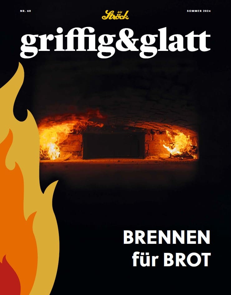 Ein mit Holz befeuerter Ofen, in dem Flammen brennen, gesehen durch die offene Tür. Große illustrierte Flammen befinden sich auf der linken Seite, und der deutsche Text "Brennen für Brot" steht unterhalb des Ofens.