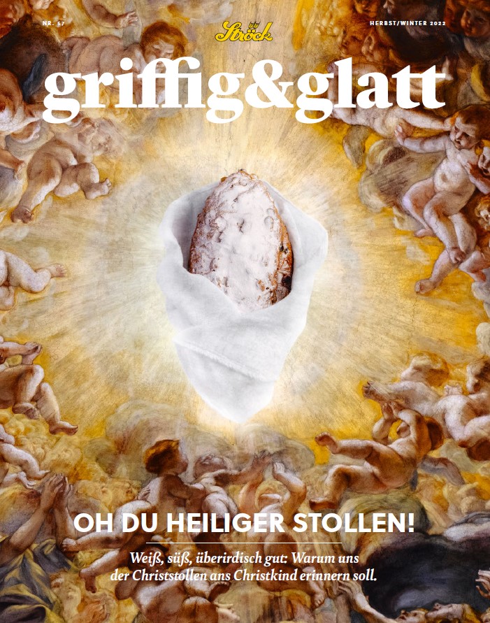 Ein in weißes Tuch eingewickelter Stollen wird von goldenen Engelsfiguren vor einem wolkenverhangenen Himmel umgeben. Der Text lautet: Oh du heiliger Stollen! und weitere deutsche Redewendungen über das Brot.